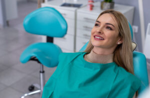 happy woman at dentist's office patient comfort