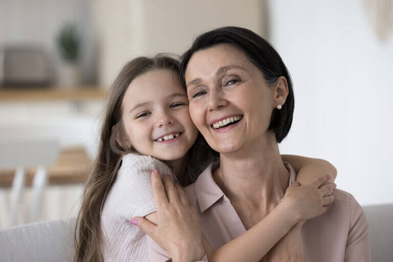 smiing child and grandmother